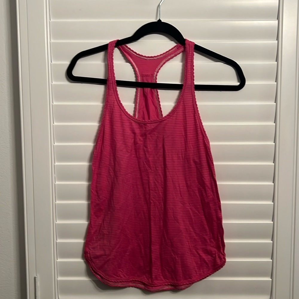 Pink Lululemon tank top with gray stripes, size 4, measures 22”x 15”